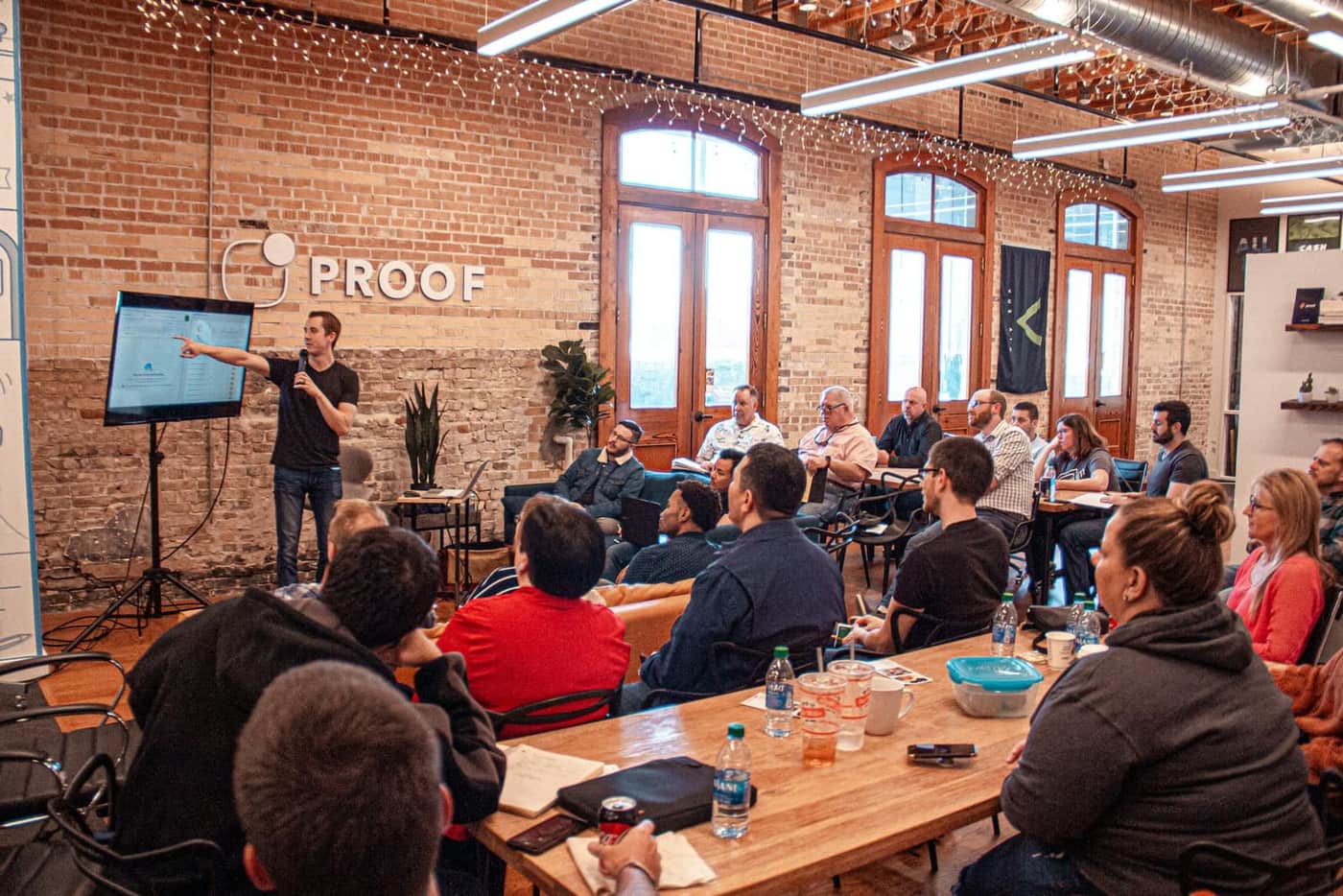Instructor delivering a safety training session to a room of workers